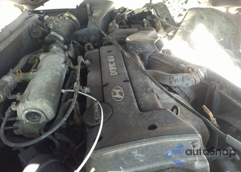 2000 Hyundai Elantra Gls из США, поврежденный, VIN KMHJF35F3YU963458